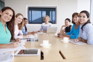 group of smiling women in a focus group