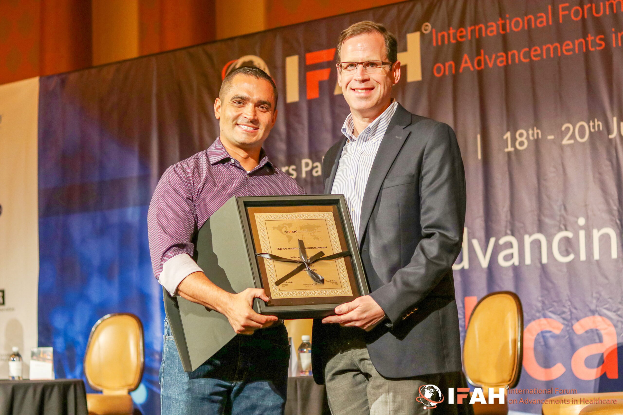 dr blight accepting caregiving award