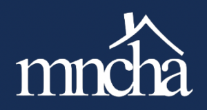 mncha white logo on blue background