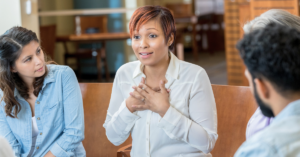 caregiver support group leader using caregiving models in support group session