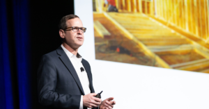 Dr. Aaron Blight delivering a keynote talk on caregiving.